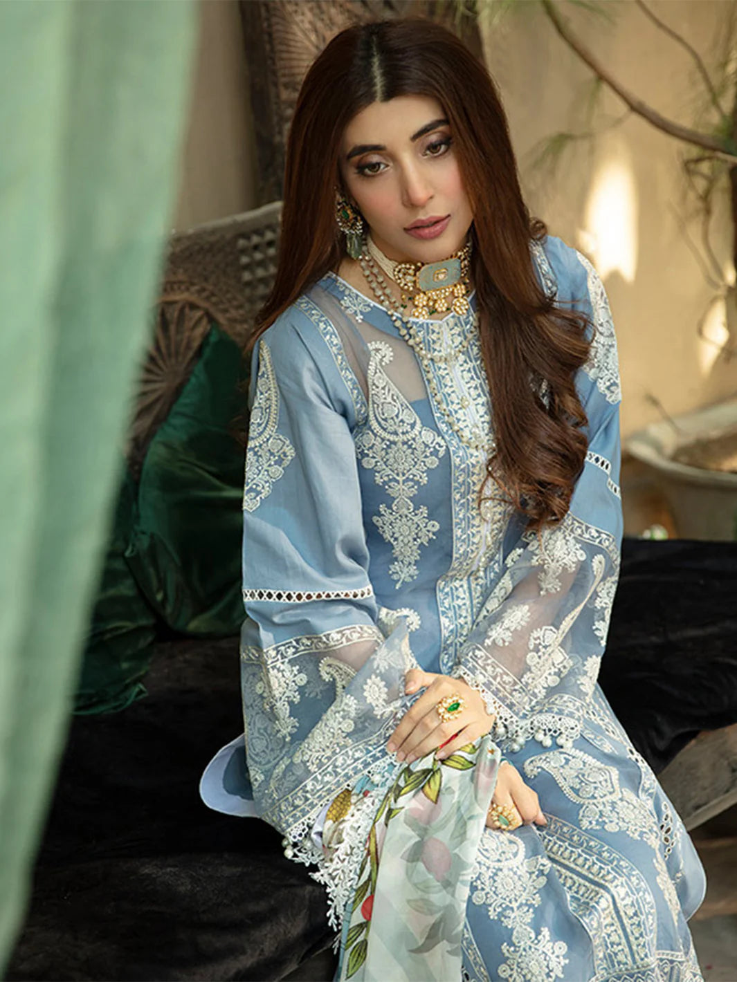 BIN ILYAS 3-piece luxury summer lawn set featuring vibrant, lightweight fabric in bright, colorful patterns for stylish summer wear.