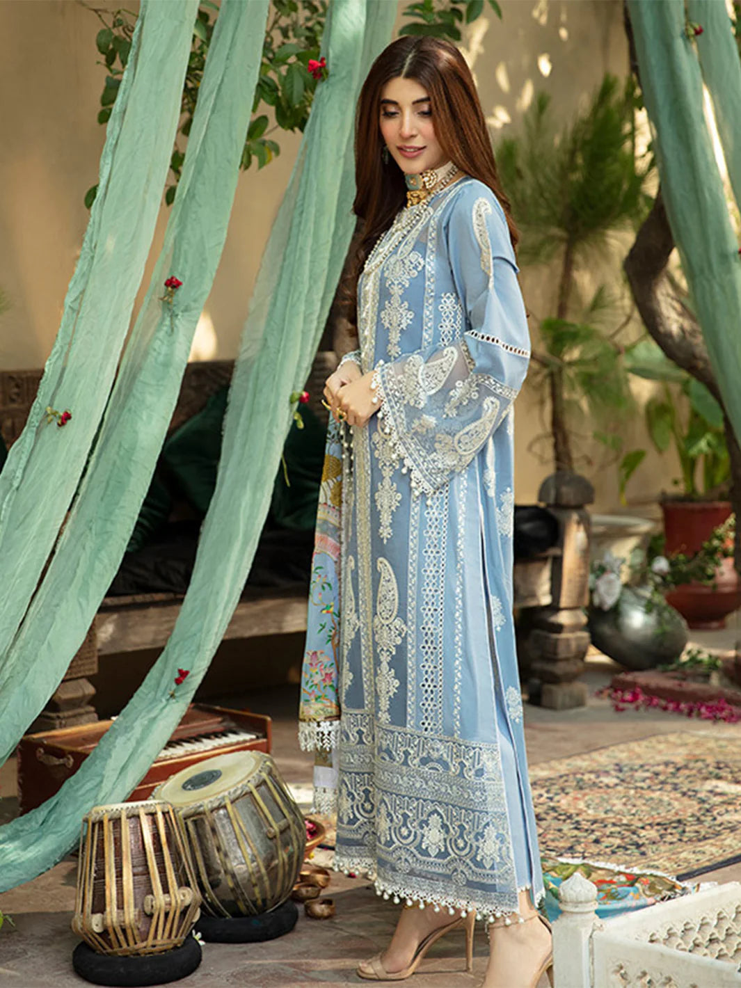 BIN ILYAS 3-piece luxury summer lawn set featuring vibrant, colorful fabric and elegant design for stylish summer wear.